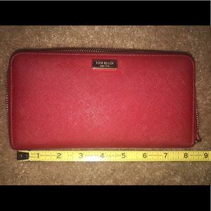 Beautiful red Kate Spade wallet in GUC